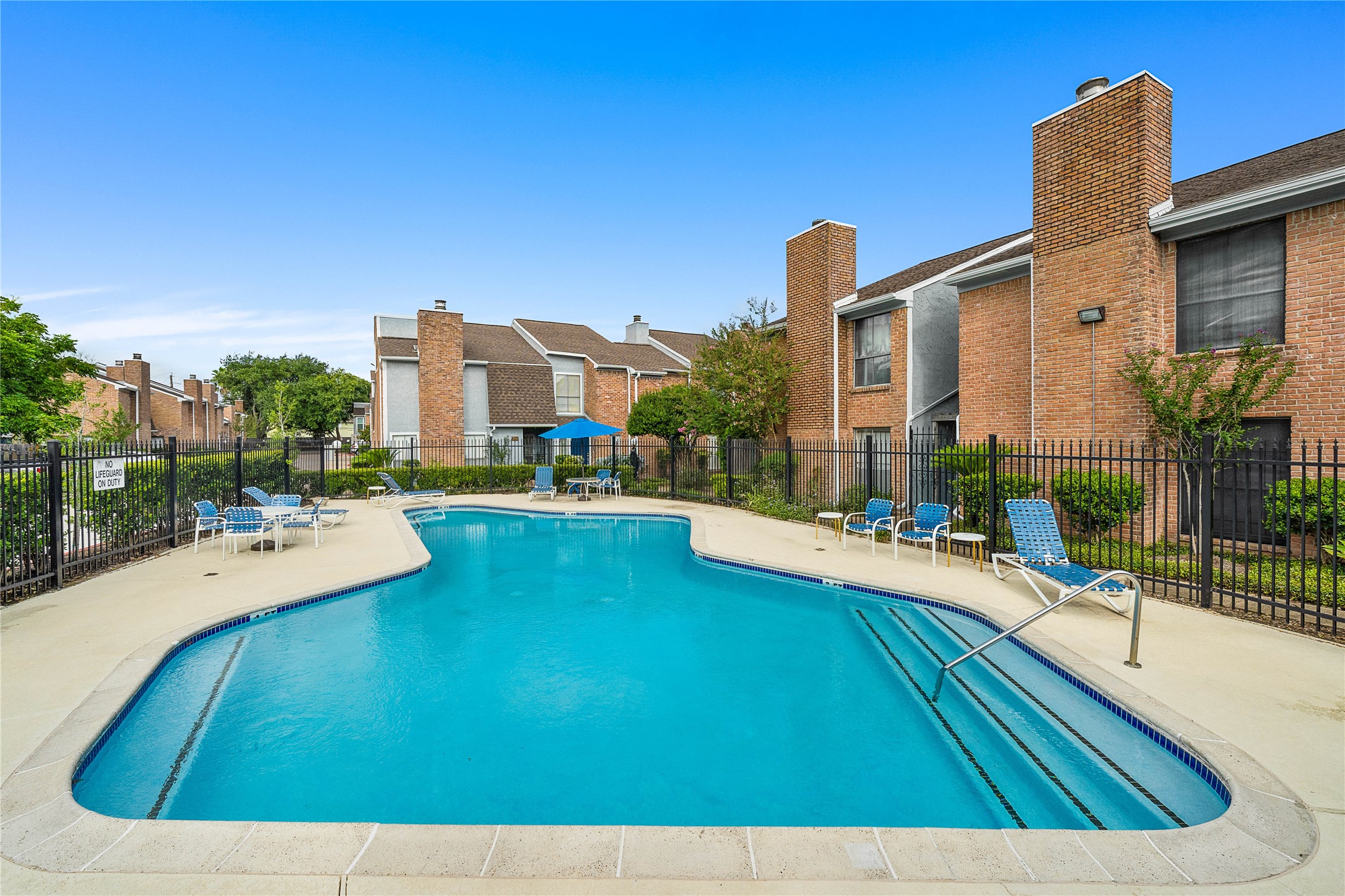 3200 South Gessner Road, Unit 330 Houston, TX 77063 - Photo 21 of 27 a view of a house with swimming pool and sitting area