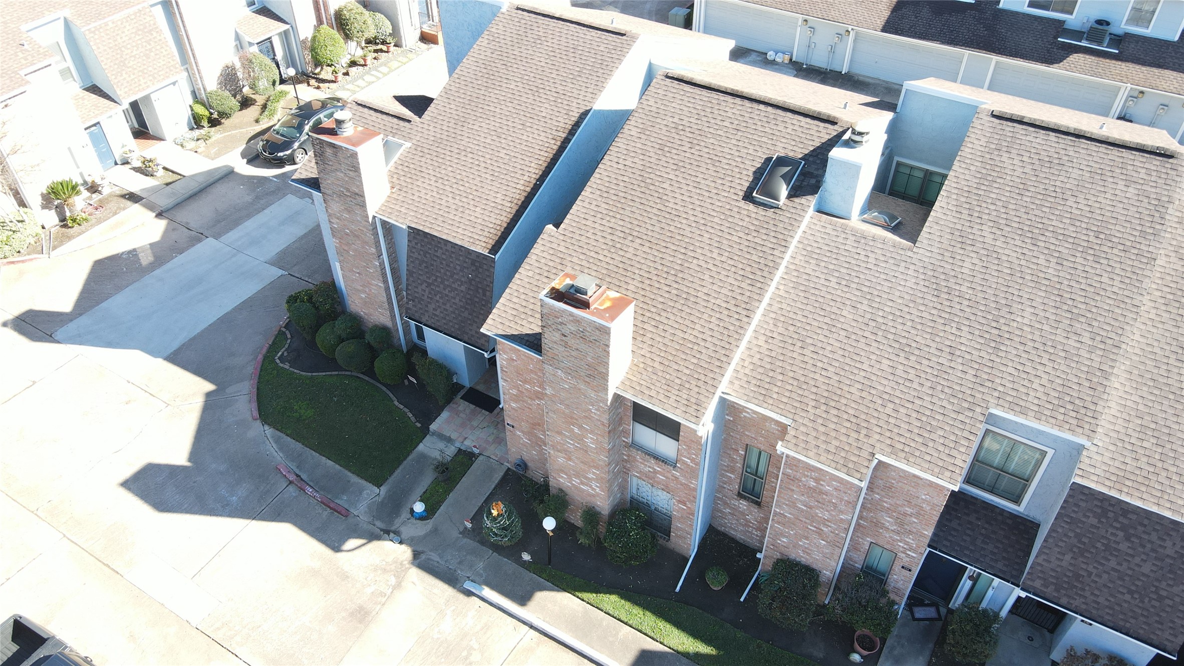 3200 South Gessner Road, Unit 330 Houston, TX 77063 - Photo 23 of 27 an aerial view of a house with furniture and wooden floor