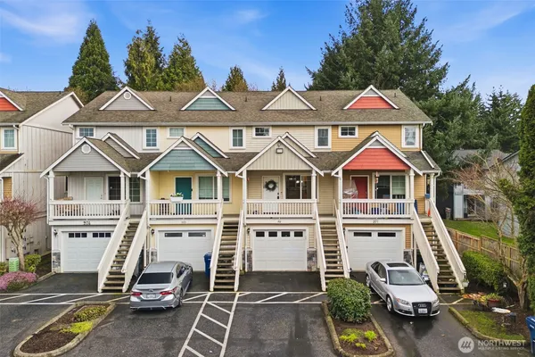 a aerial view of a house with a porch