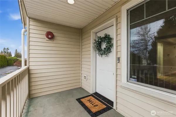 a view of a door and a window