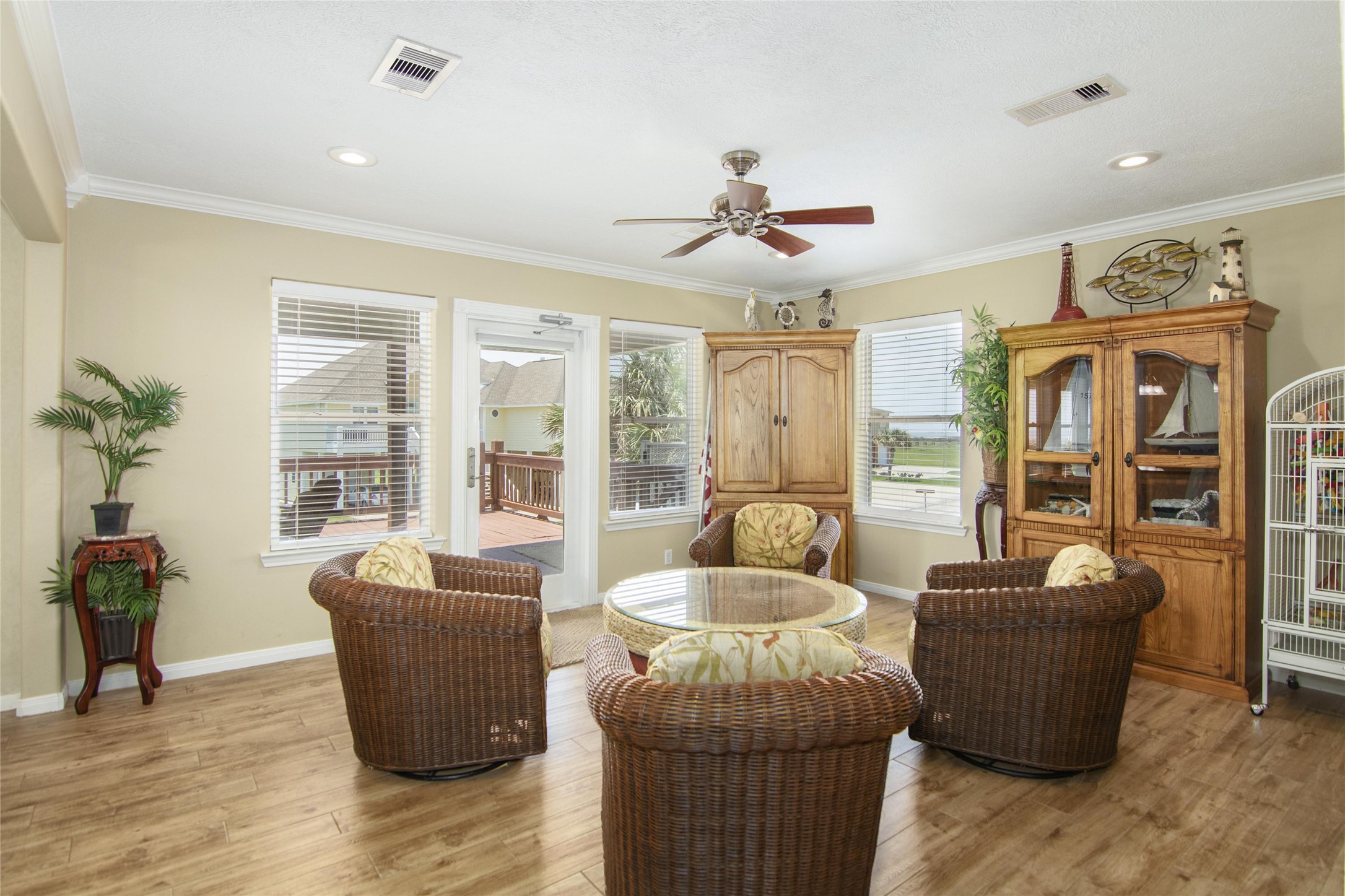 3933 Biscayne Beach Road Port Bolivar, TX 77650 - Photo 11 of 24 a living room with furniture potted plant and windows