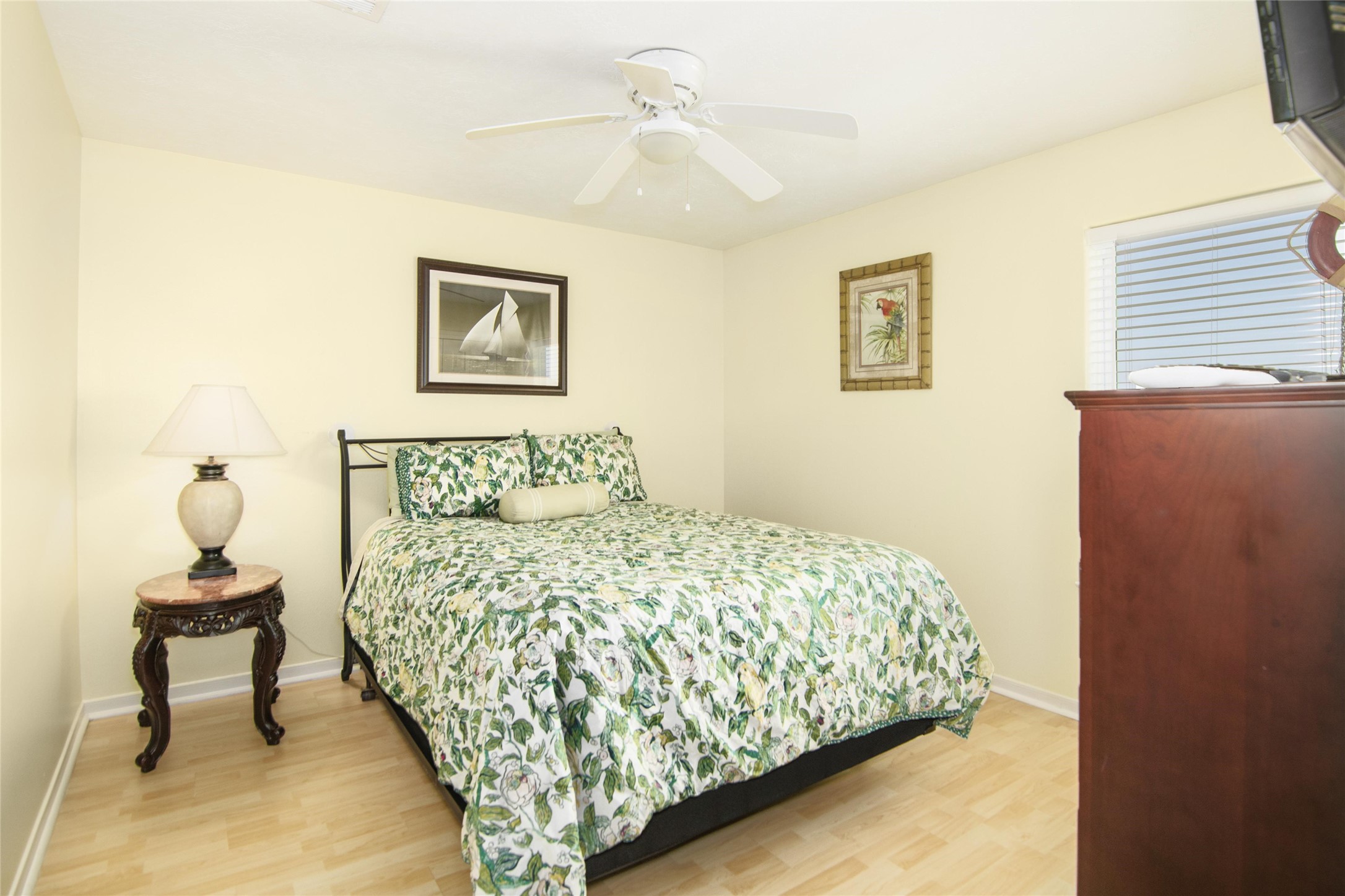 3933 Biscayne Beach Road Port Bolivar, TX 77650 - Photo 15 of 24 a bedroom with a bed and a lamp