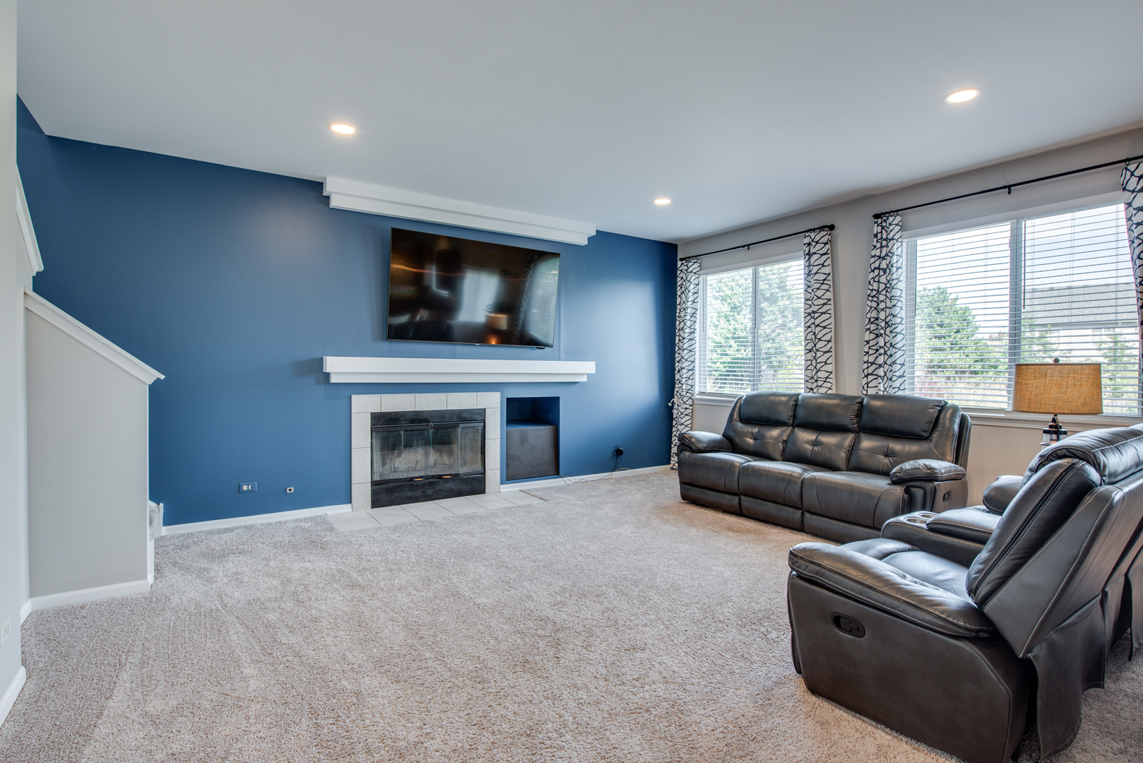 416 Hubbard Circle Plano, IL 60545 - Photo 12 of 57 a living room with furniture and a fireplace