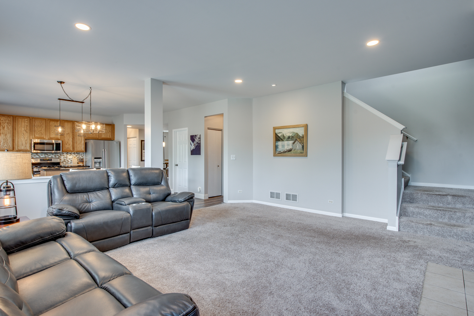 416 Hubbard Circle Plano, IL 60545 - Photo 14 of 57 a living room with furniture and a large window