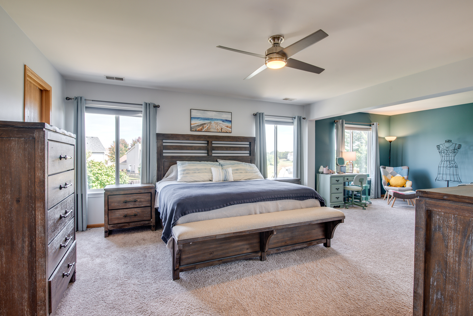 416 Hubbard Circle Plano, IL 60545 - Photo 15 of 57 a bedroom with furniture and a window