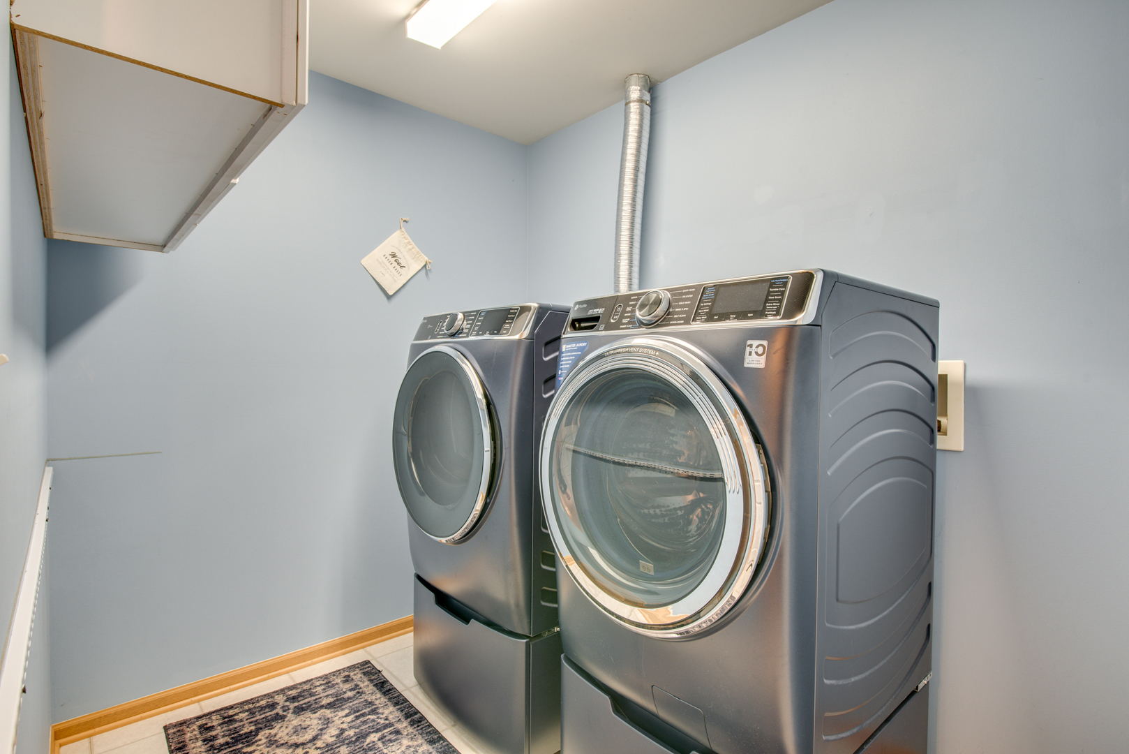 416 Hubbard Circle Plano, IL 60545 - Photo 25 of 57 a utility room with dryer and washer
