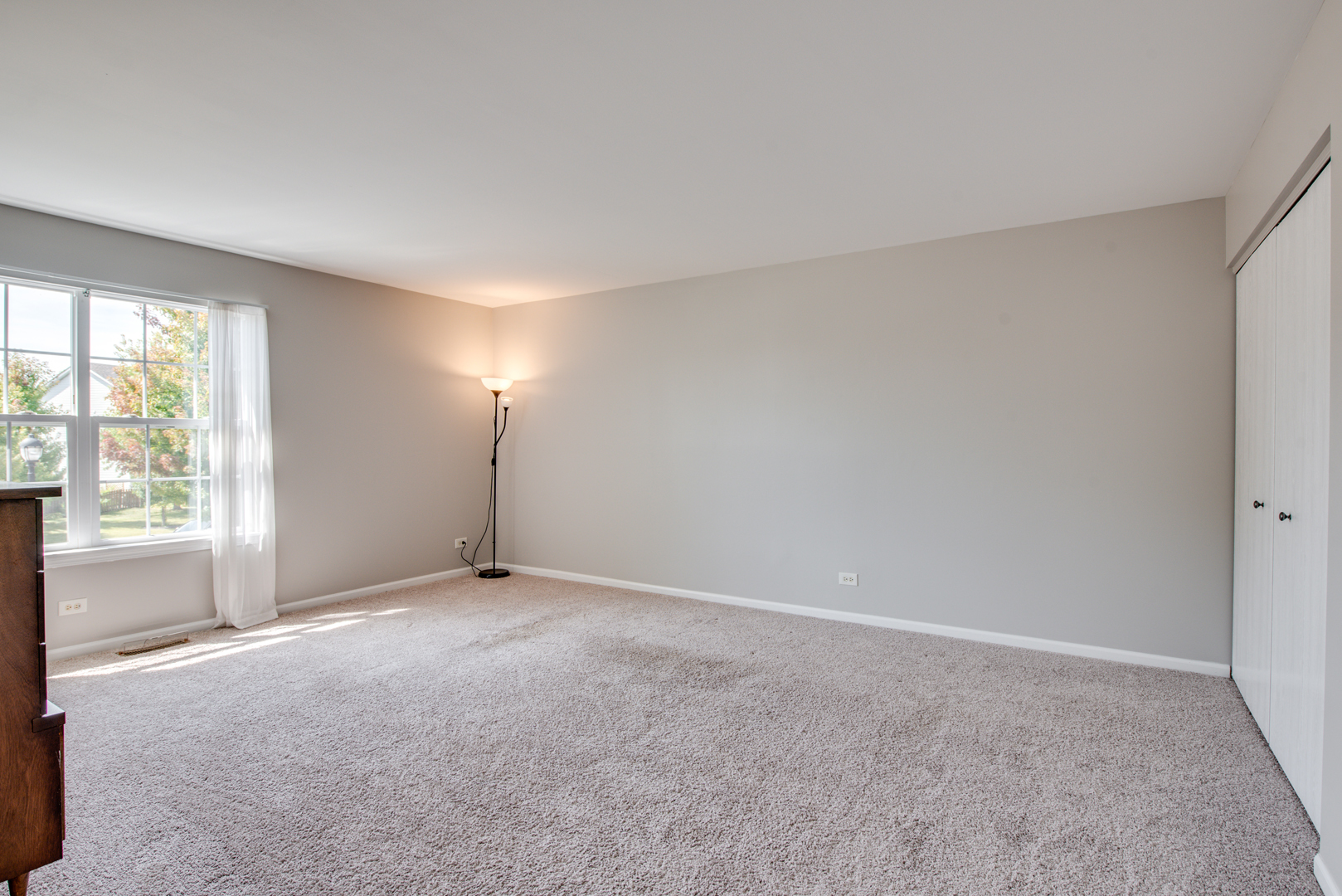 416 Hubbard Circle Plano, IL 60545 - Photo 27 of 57 a view of an empty room with a window
