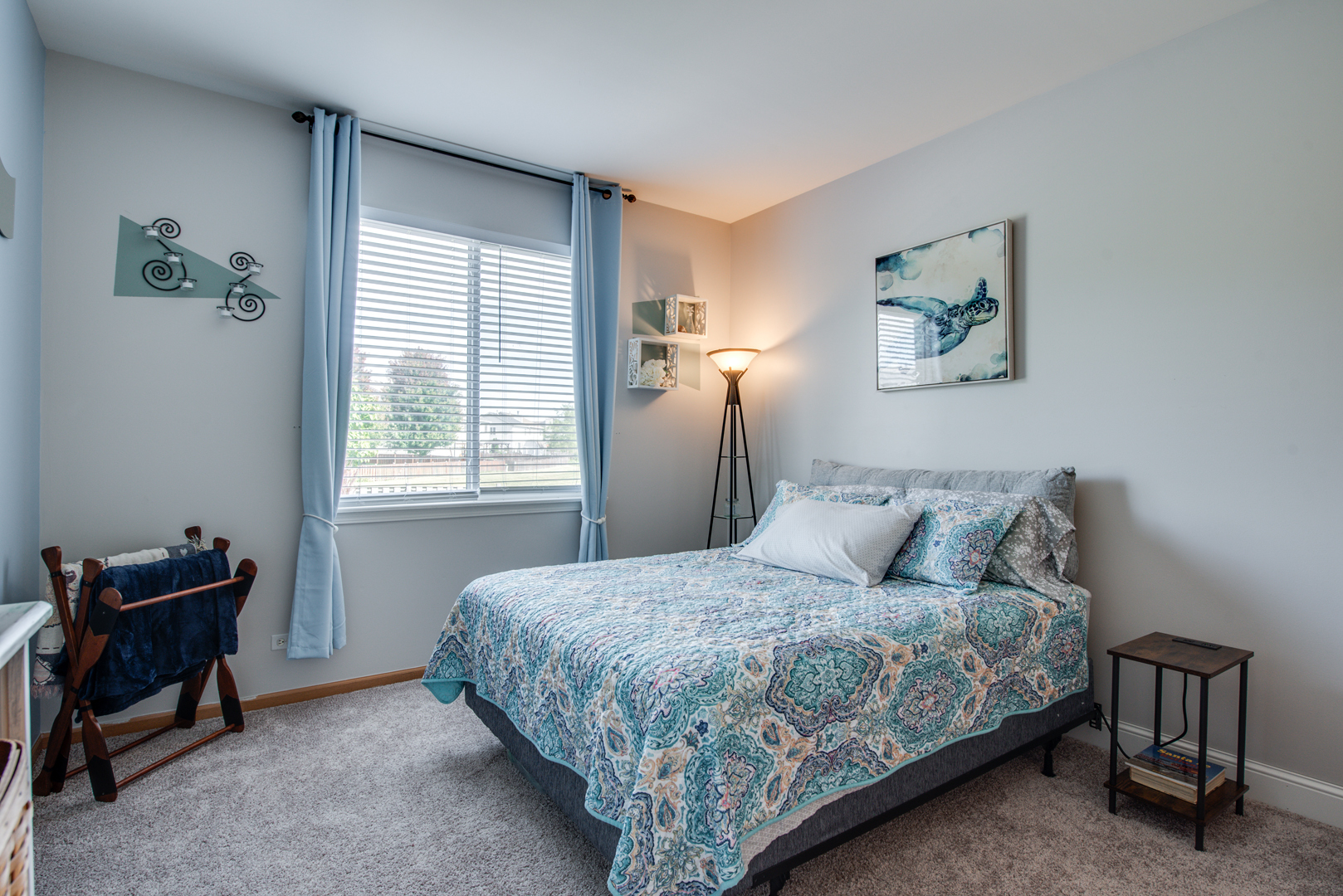 416 Hubbard Circle Plano, IL 60545 - Photo 28 of 57 a bedroom with a bed and a window