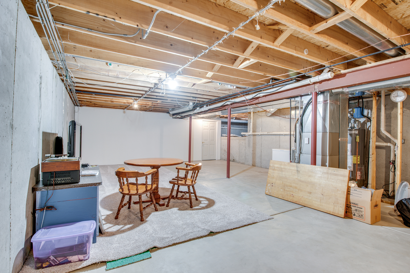 416 Hubbard Circle Plano, IL 60545 - Photo 30 of 57 a dining room with furniture and a chandelier
