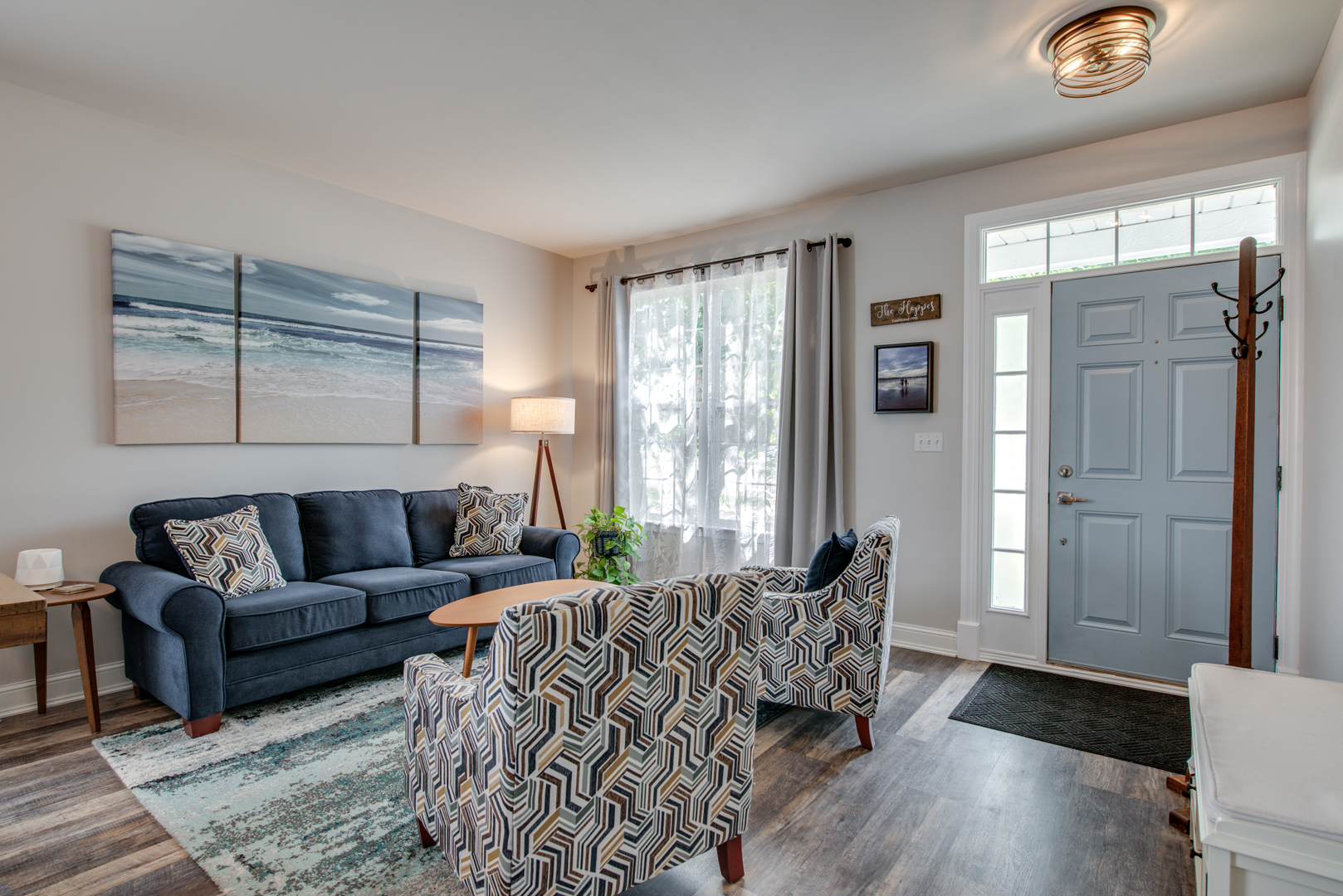 416 Hubbard Circle Plano, IL 60545 - Photo 3 of 57 a living room with furniture and a window