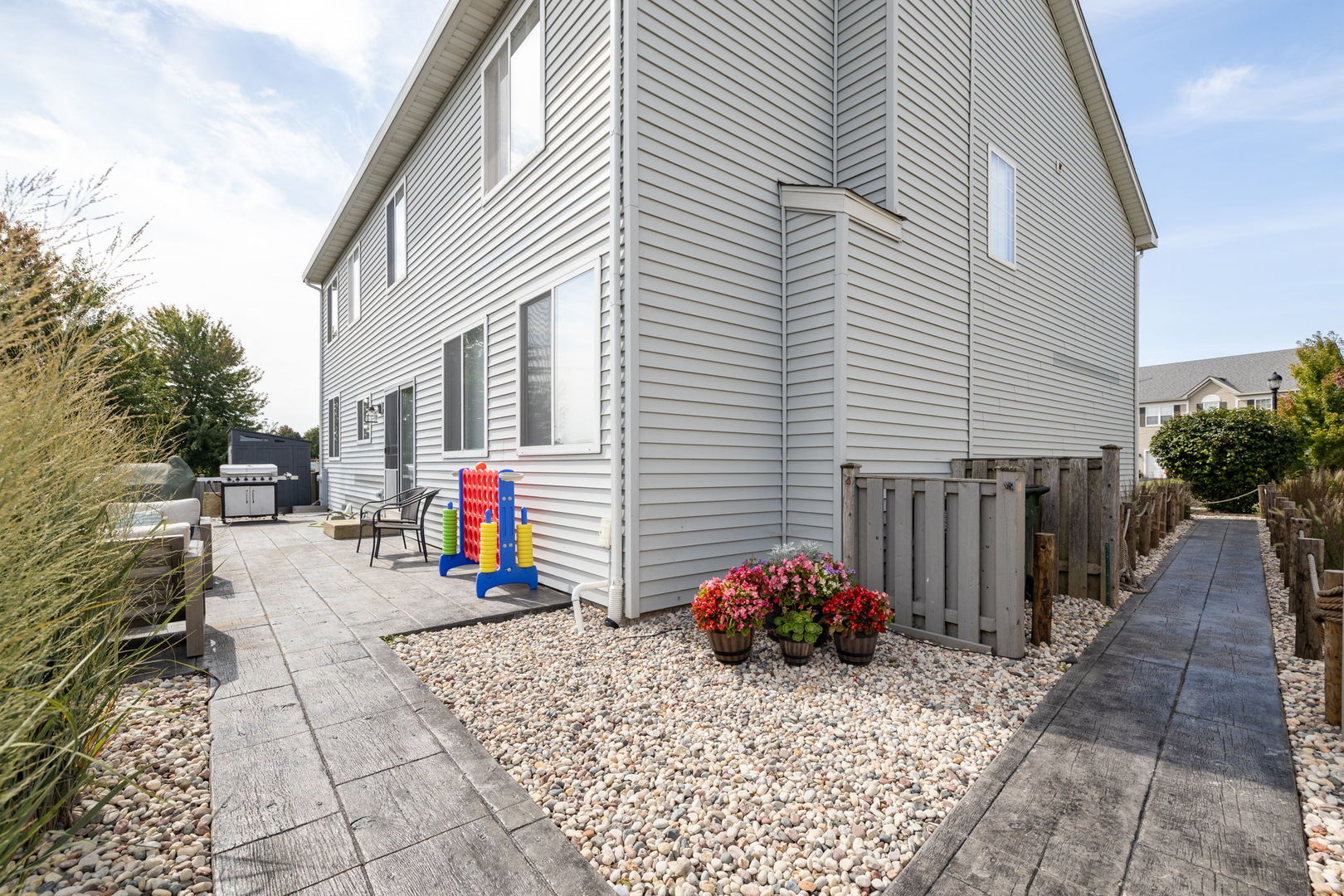 416 Hubbard Circle Plano, IL 60545 - Photo 38 of 57 a view of a backyard with a sitting area