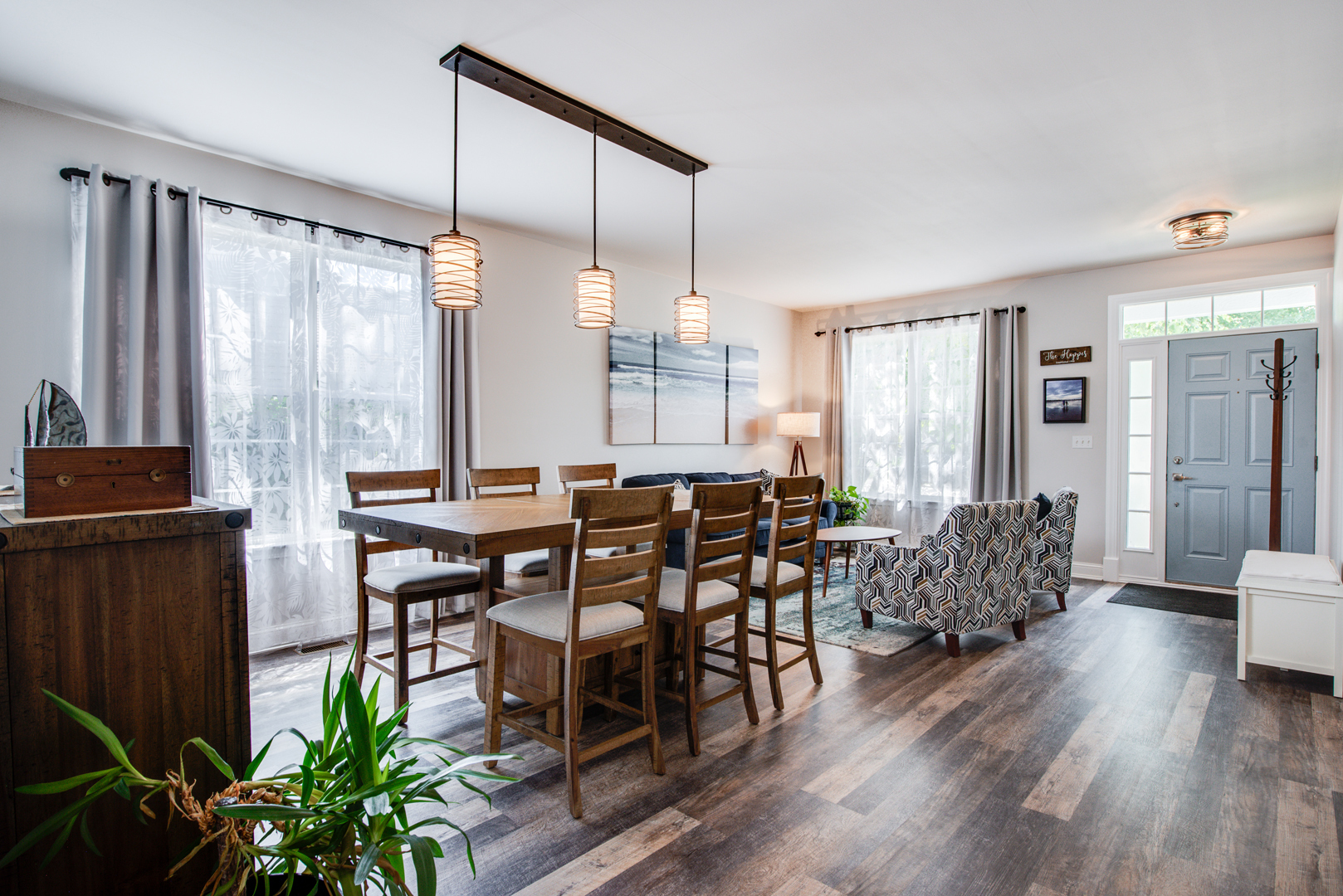 416 Hubbard Circle Plano, IL 60545 - Photo 4 of 57 a view of a dining room with furniture window and wooden floor