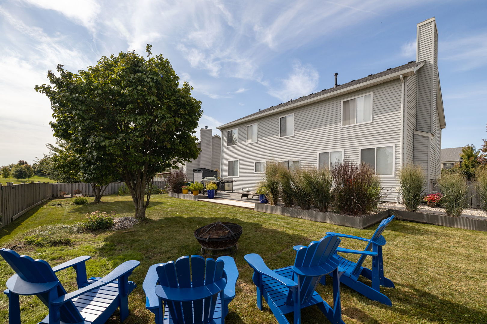 416 Hubbard Circle Plano, IL 60545 - Photo 45 of 57 a swimming pool with outdoor seating and yard