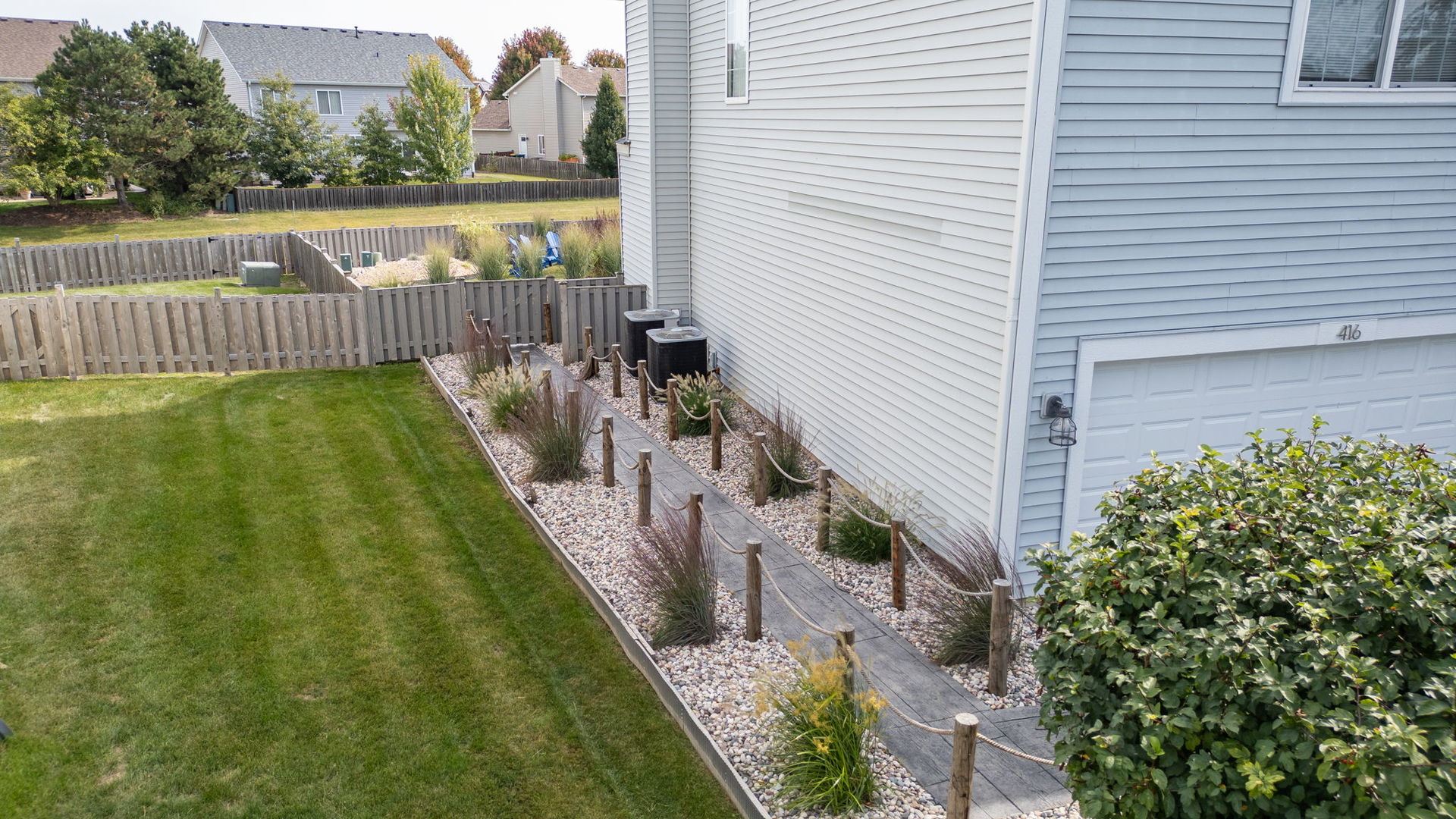 416 Hubbard Circle Plano, IL 60545 - Photo 56 of 57 a balcony with view of garden