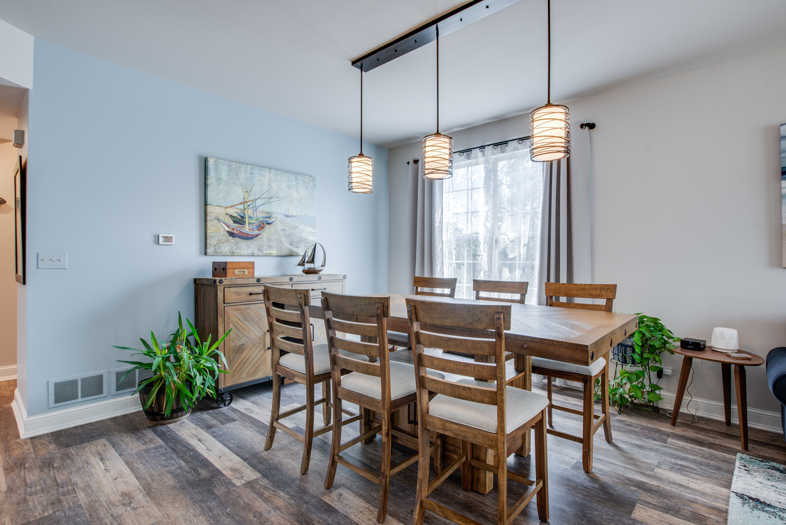 416 Hubbard Circle Plano, IL 60545 - Photo 6 of 57 a view of a dining room with furniture window and wooden floor