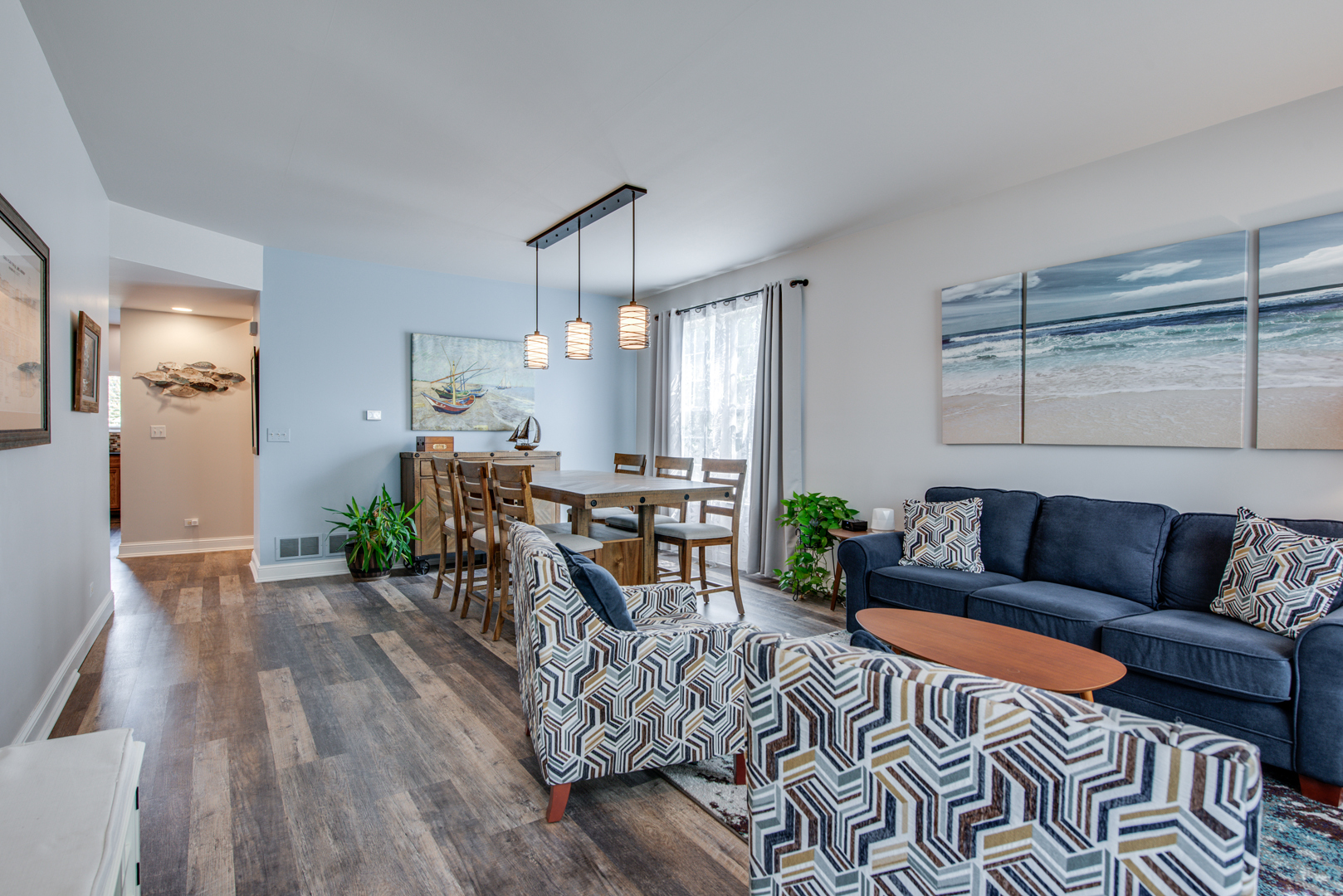 416 Hubbard Circle Plano, IL 60545 - Photo 7 of 57 a living room with furniture and wooden floor