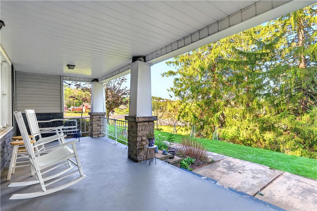 1188 Willowbrook Road Belle Vernon, PA 15012 - Photo 24 of 50 a view of a patio with table and chairs and potted plants