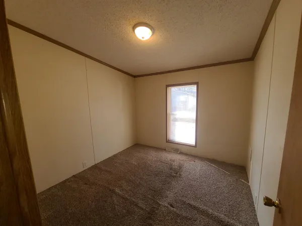 a view of empty room with window