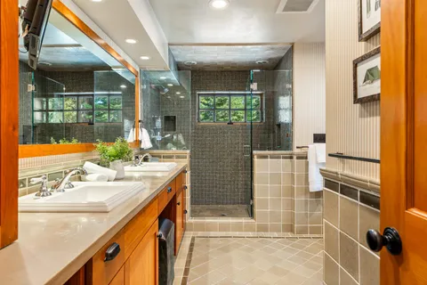 a kitchen with a sink and cabinets