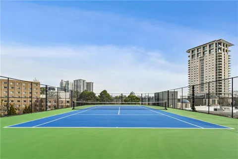 a view of outdoor space and tennis court