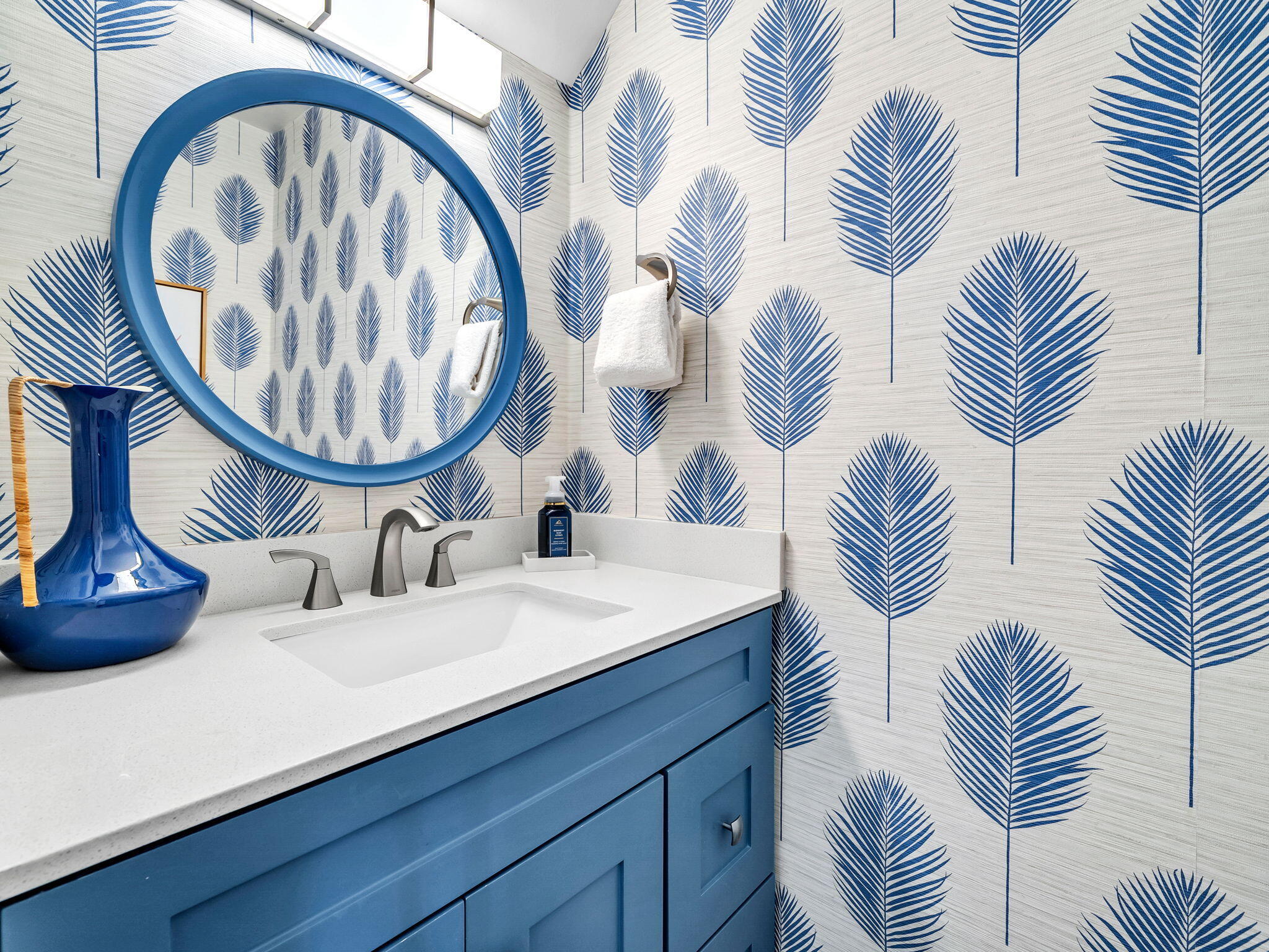 23011 Front Beach Road, Unit W42 Panama City Beach, FL 32413 - Photo 11 of 30 a bathroom with a sink and a mirror