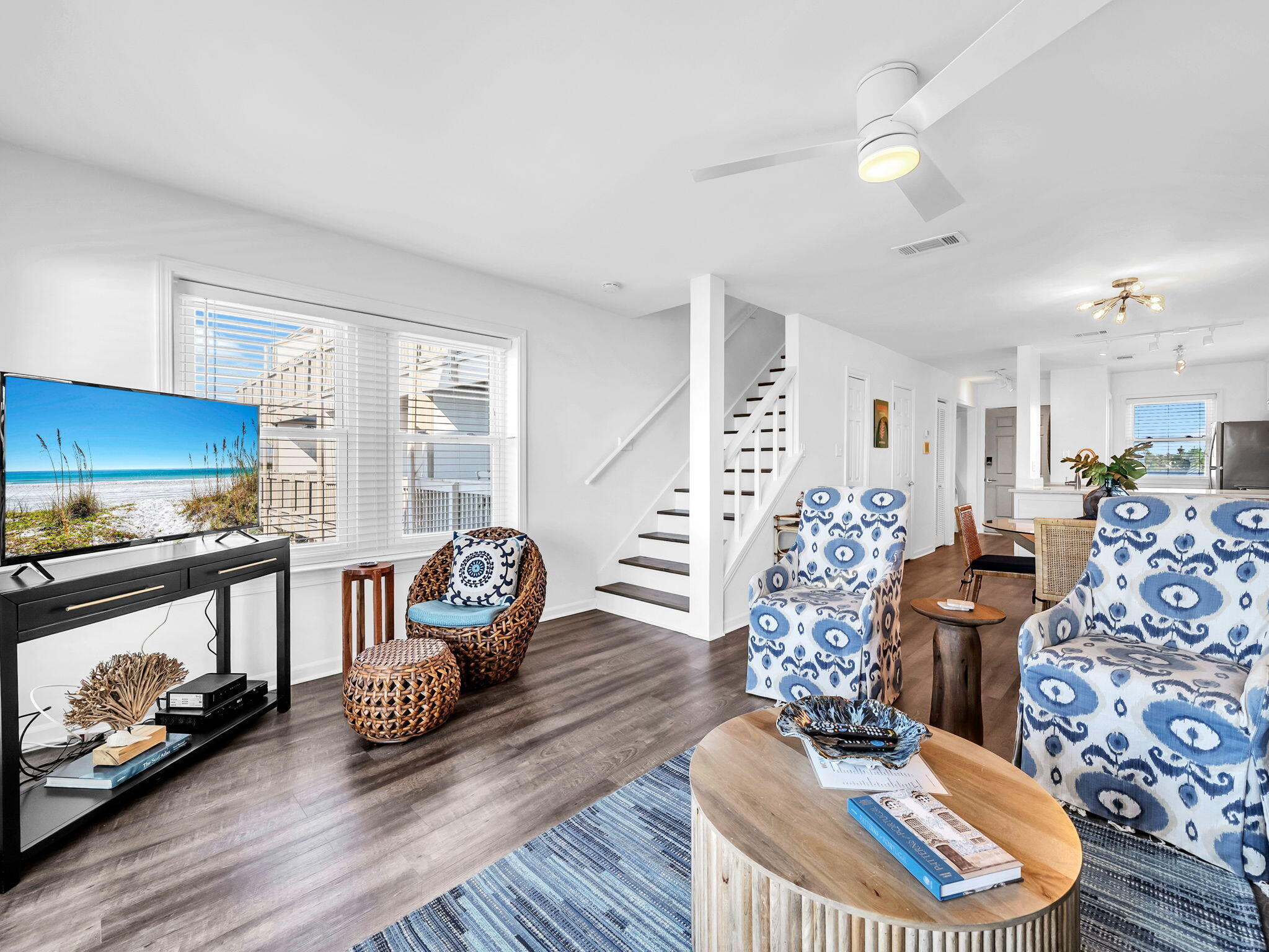 23011 Front Beach Road, Unit W42 Panama City Beach, FL 32413 - Photo 14 of 30 a living room with furniture and a wooden floor