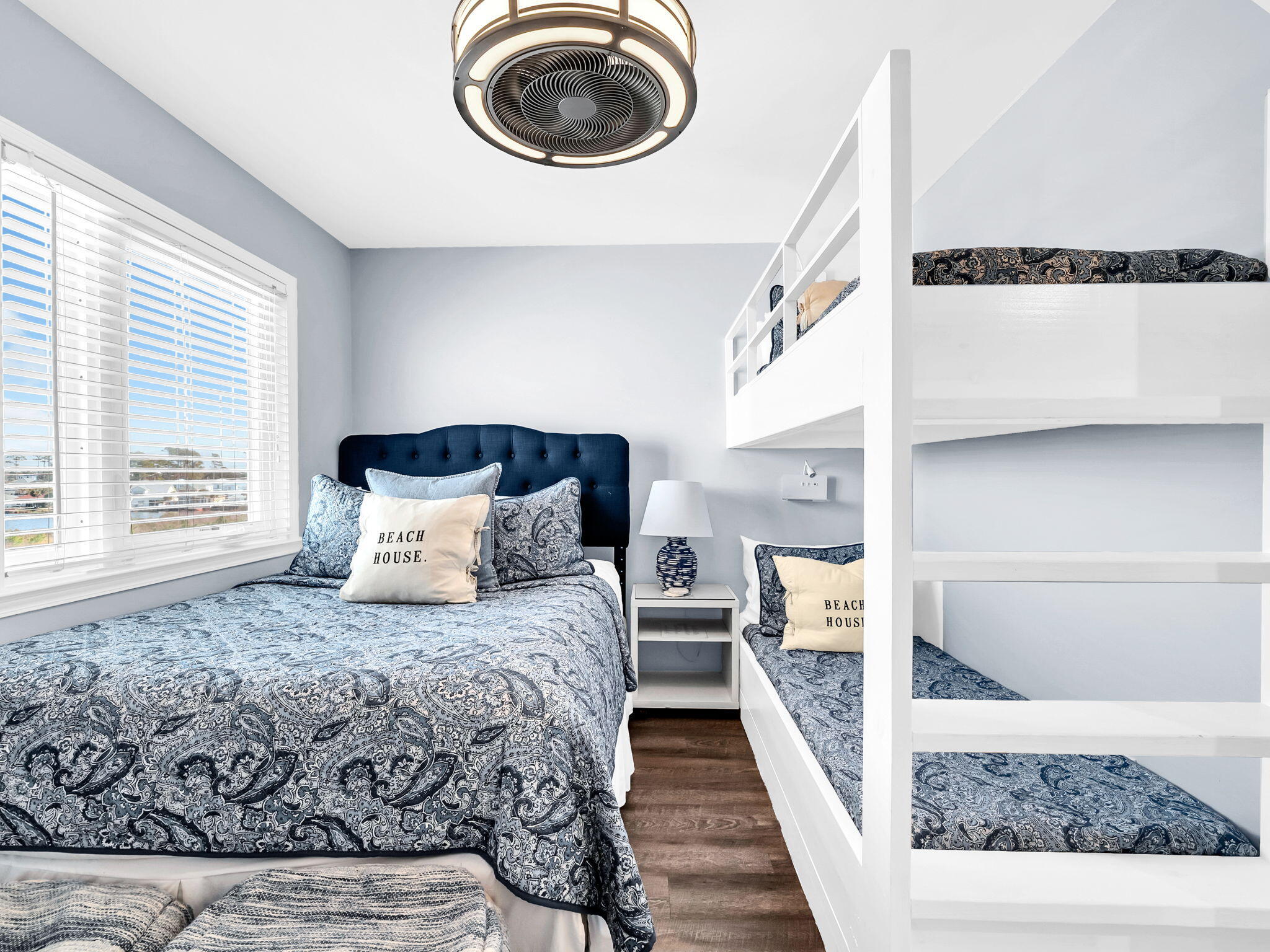 23011 Front Beach Road, Unit W42 Panama City Beach, FL 32413 - Photo 16 of 30 a bedroom with a bed and a large window