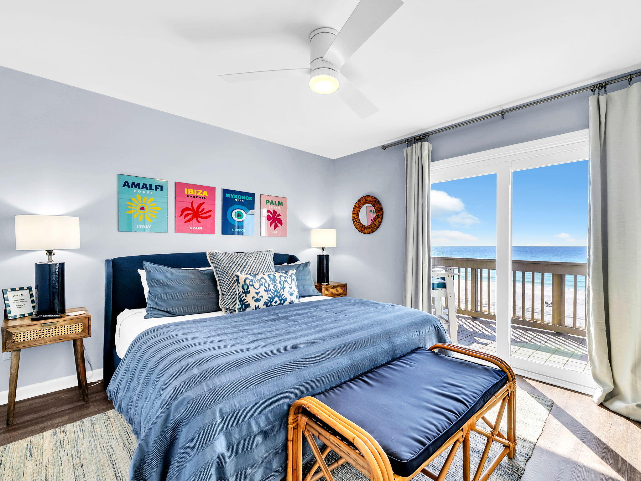 23011 Front Beach Road, Unit W42 Panama City Beach, FL 32413 - Photo 17 of 30 a bedroom with a bed and a dresser next to a window