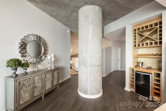 a room with furniture and wooden floor