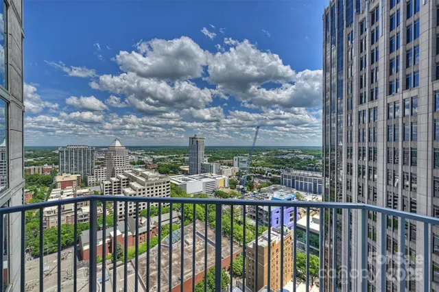 a view of city from a balcony