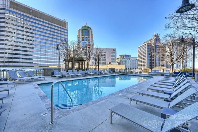 a view of a balcony with chairs