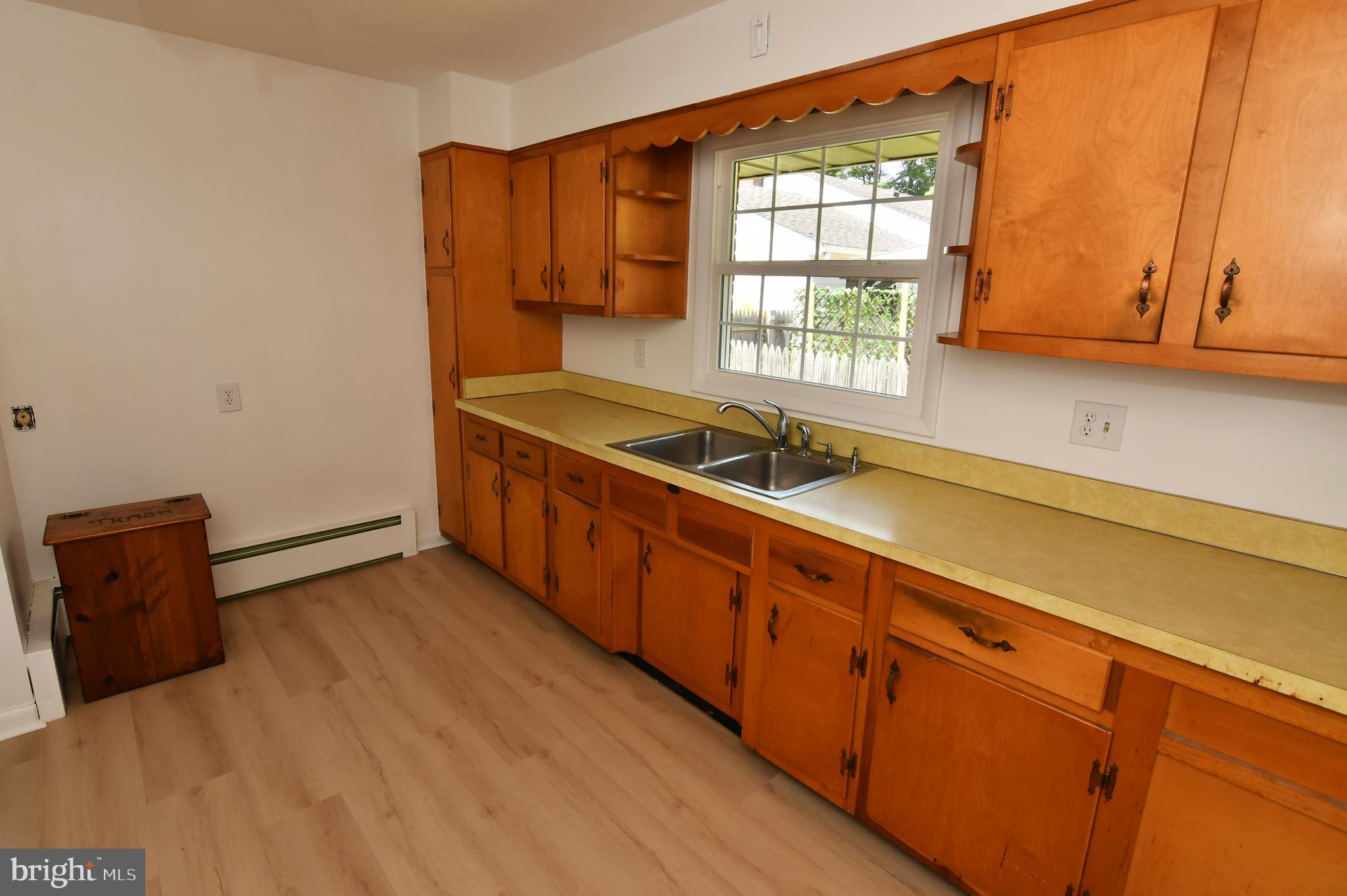 437 Beechcroft Road Winchester, VA 22601 - Photo 16 of 52 a kitchen with stainless steel appliances granite countertop a sink and a microwave