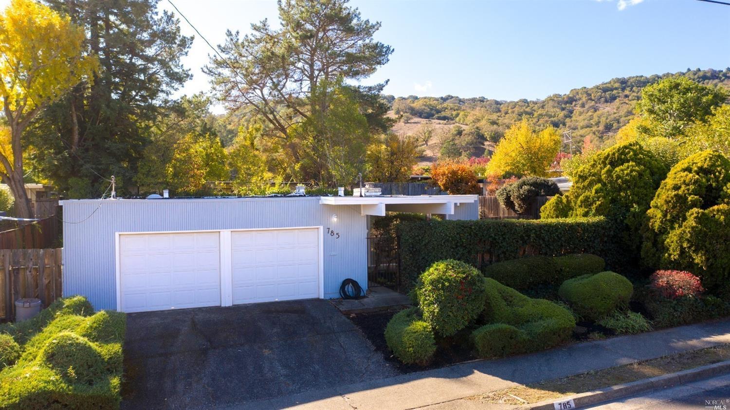 785 Del Ganado Road San Rafael, CA 94903 - Photo 1 of 1 a backyard of a house with lots of green space