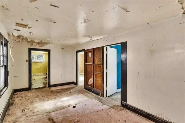 an empty room with windows