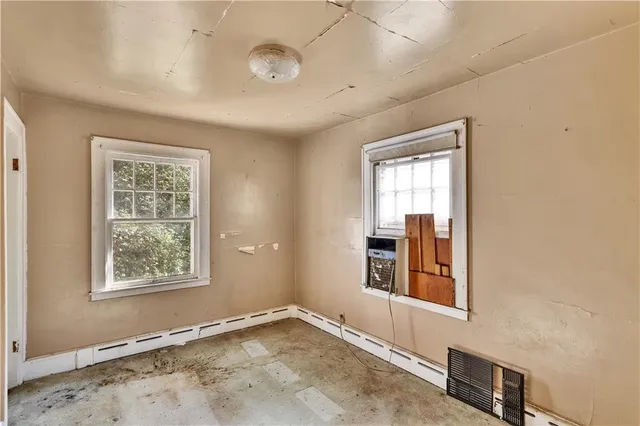 front view of a house with a small yard