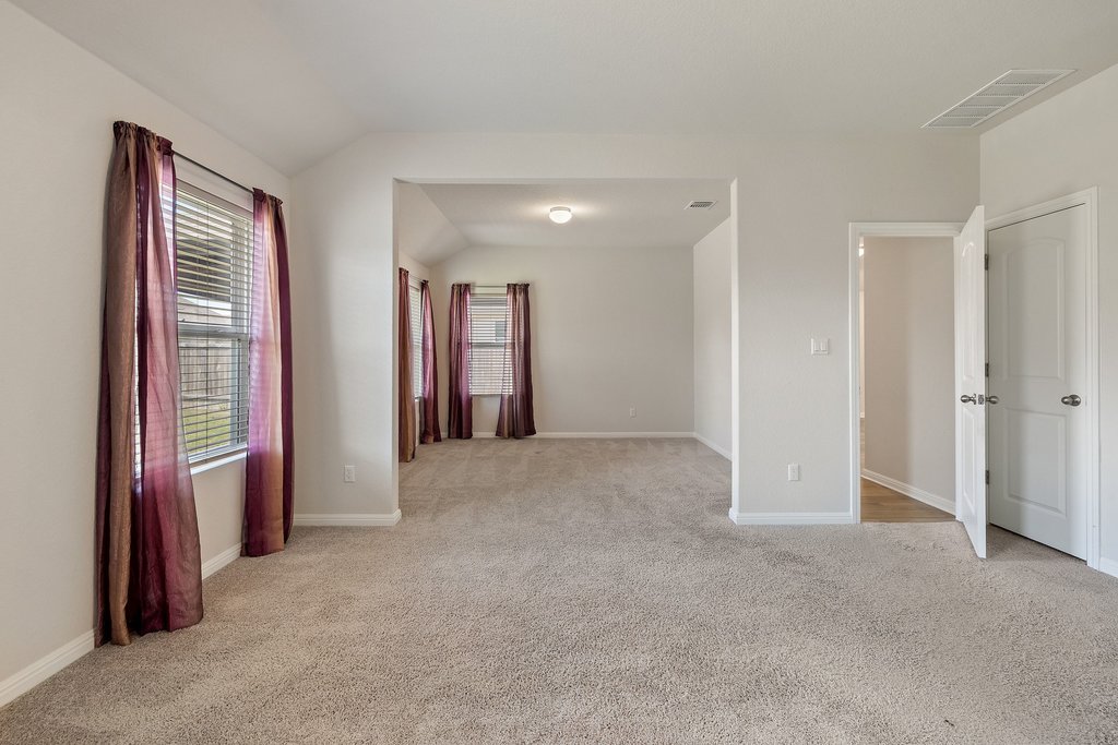 105 Cupa Monti Road Hutto, TX 78634 - Photo 14 of 28 Primary Bedroom with attached secondary office space/nursery/flex space