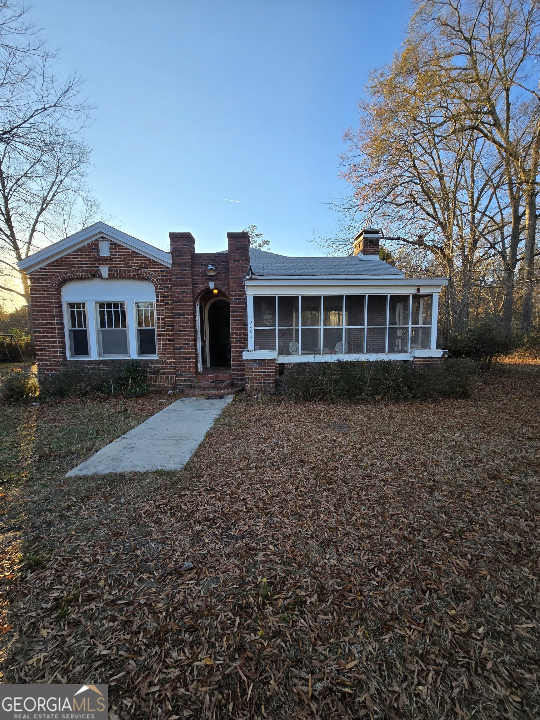 5091 Old Atlanta Road Hampton, GA 30228 - Photo 1 of 1 front view of a house with a yard