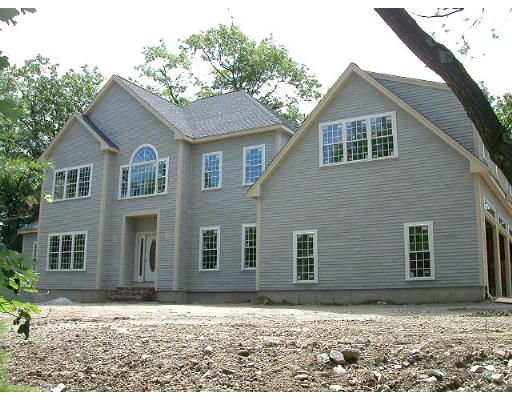 Lot 1 Forge Village Road Groton, MA 01450 - Photo 1 of 1 a front view of a house with a yard