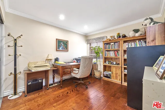 a view of a workspace with furniture and toys