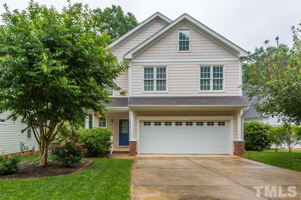 816 Nowell Ridge Road Raleigh, NC 27607 - Photo 1 of 9 a view of a house with a yard and garage
