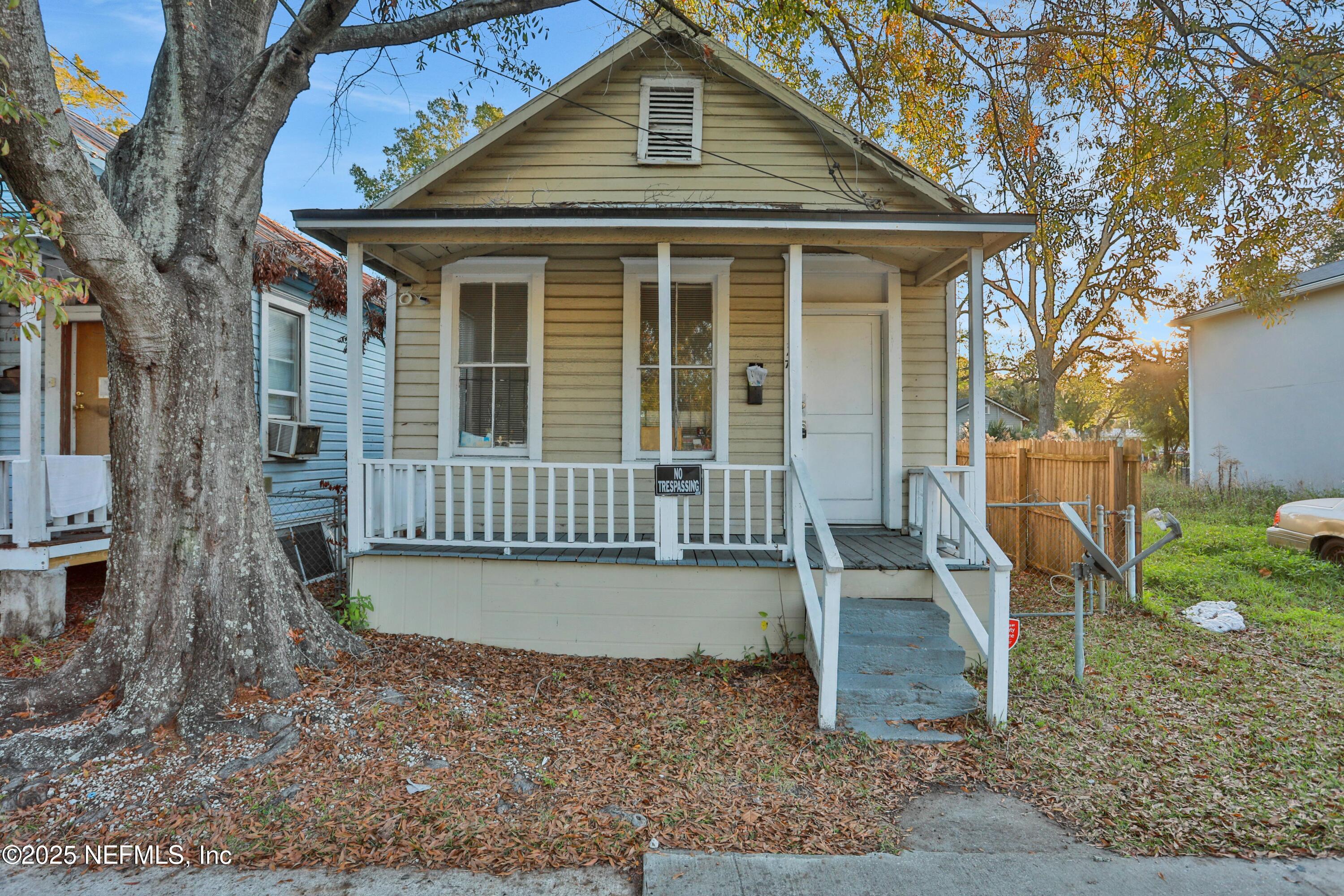 1327 Cleveland Street Jacksonville, FL 32209 - Photo 1 of 21 a front view of a house with a yard