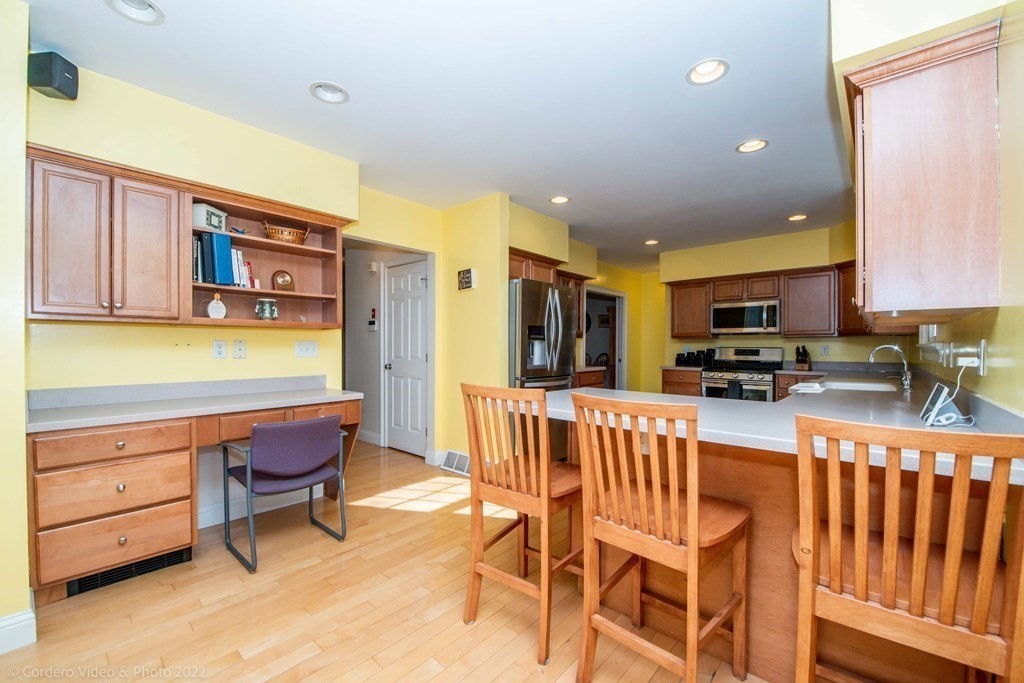 989 Walnut Plain Road Rochester, MA 02770 - Photo 17 of 41 a view of a dining room with furniture and a kitchen
