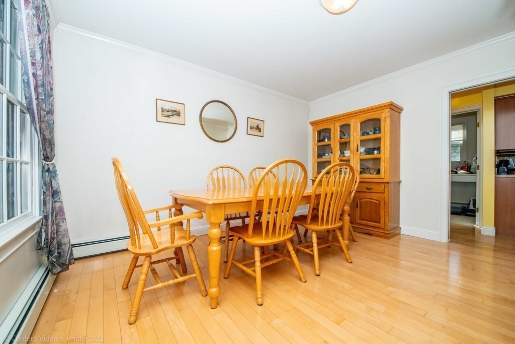 989 Walnut Plain Road Rochester, MA 02770 - Photo 20 of 41 a dining room with furniture and wooden floor
