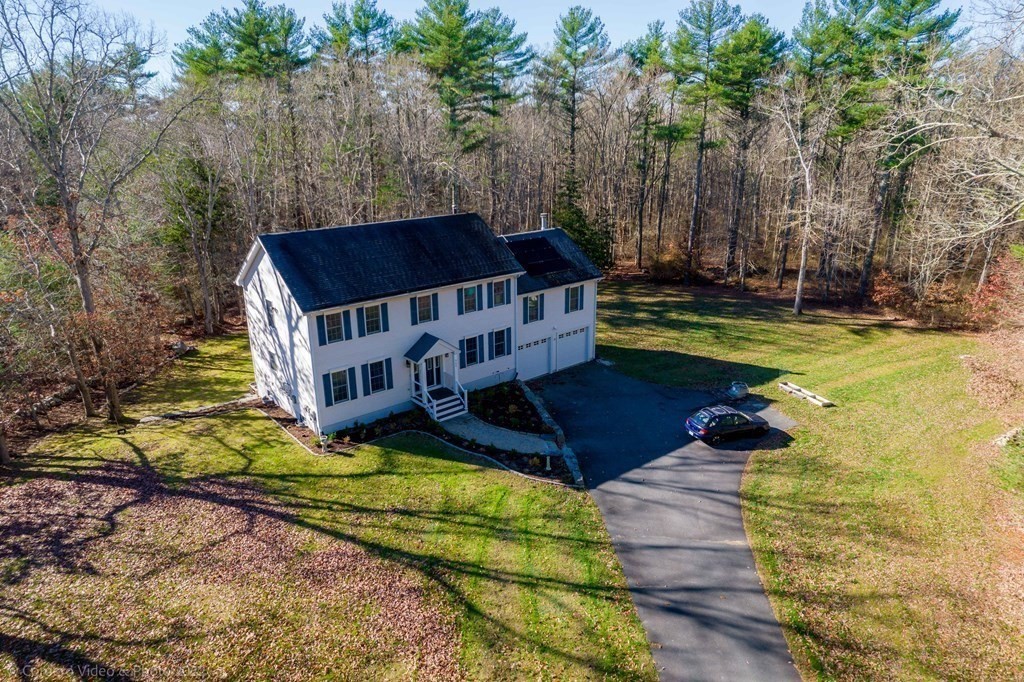 989 Walnut Plain Road Rochester, MA 02770 - Photo 2 of 41 a view of swimming pool with lawn chairs and plants
