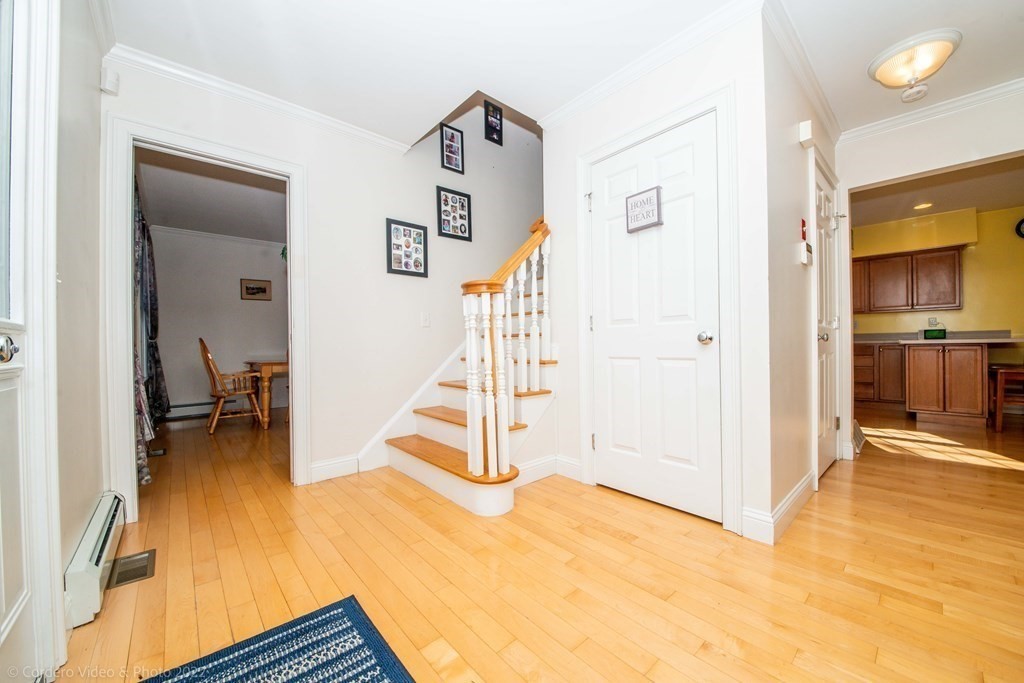 989 Walnut Plain Road Rochester, MA 02770 - Photo 23 of 41 a view of a room with wooden floor and a bathroom
