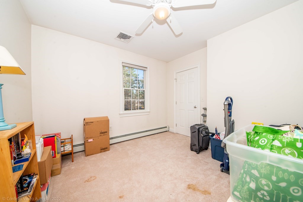 989 Walnut Plain Road Rochester, MA 02770 - Photo 37 of 41 a view of a room with toys and a chandelier