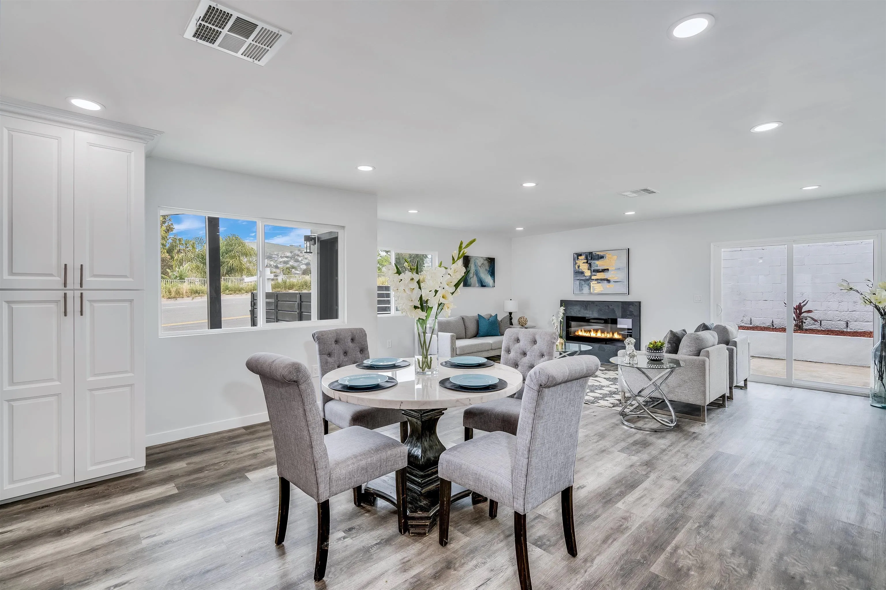 9209 Jamacha Boulevard Spring Valley, CA 91977 - Photo 13 of 22 a view of a dining room with furniture window and wooden floor