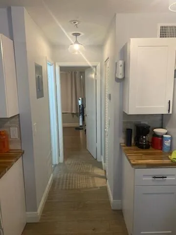 a bathroom with a toilet a sink and a mirror