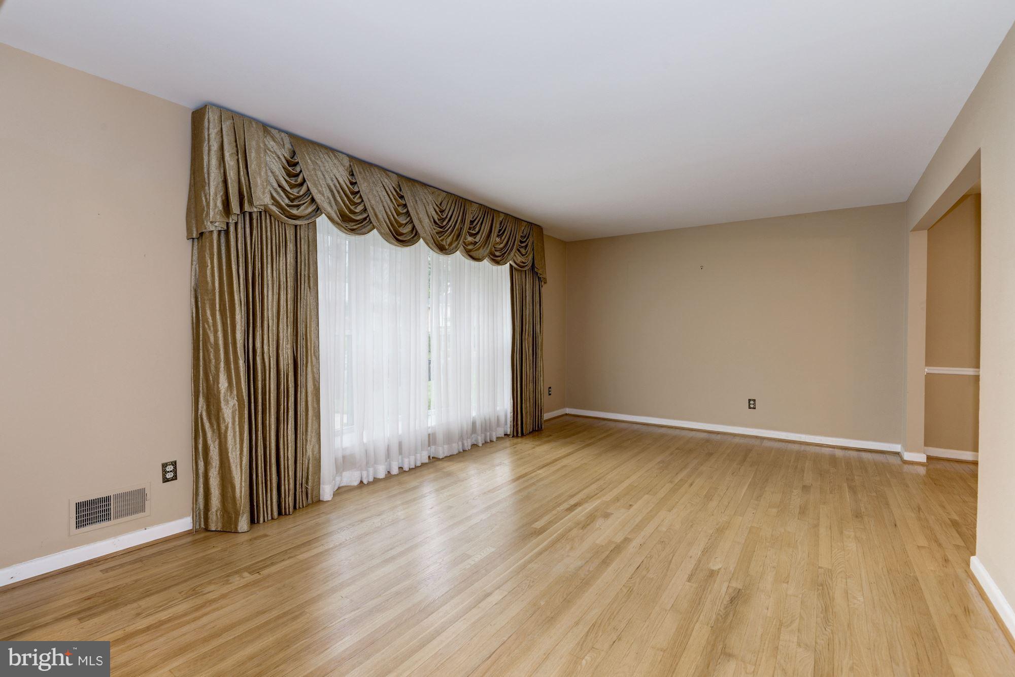 2124 Coleridge Drive Silver Spring, MD 20910 - Photo 2 of 18 Living Room/Beautiful Hardwd Floors/Custom Drapes
