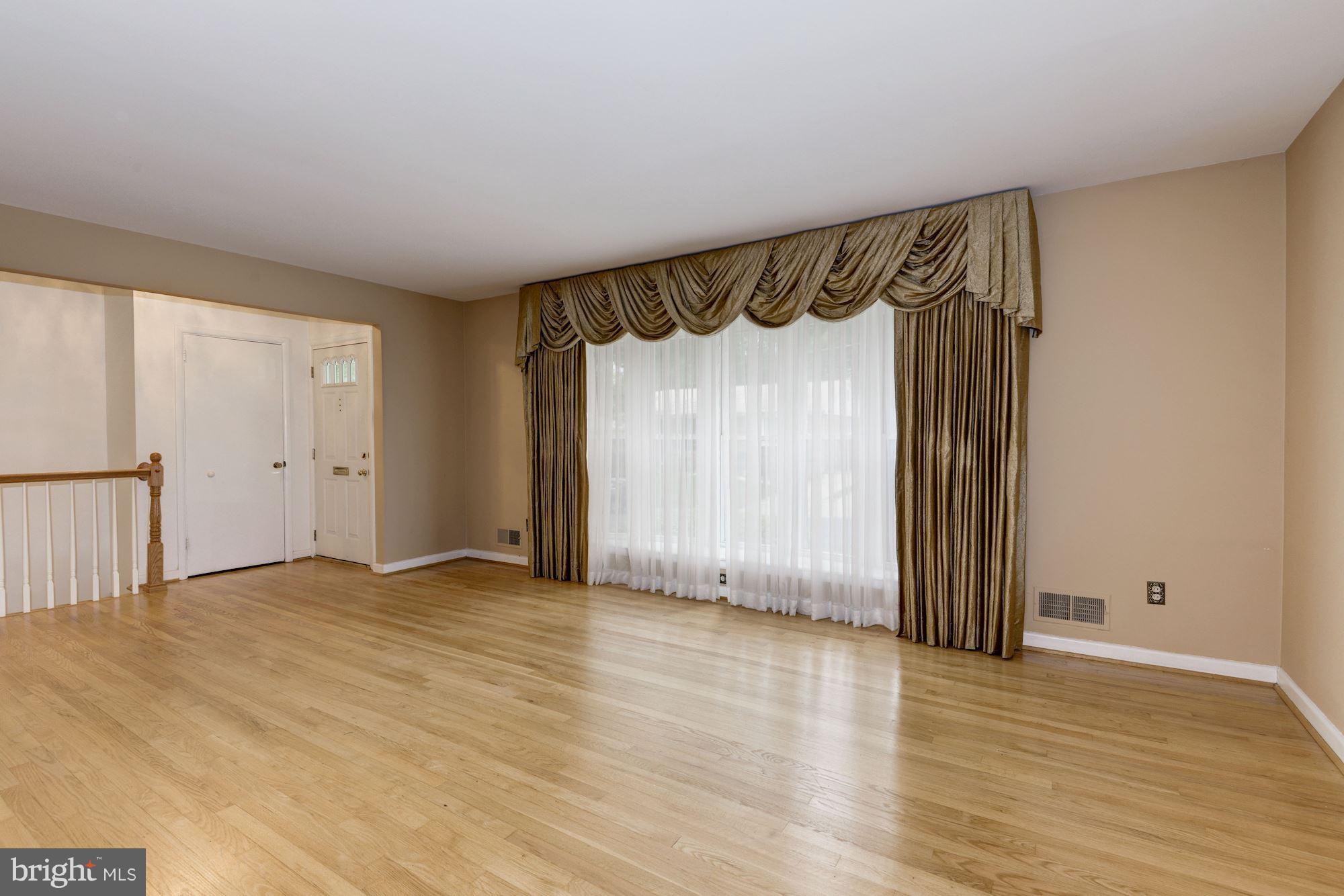 2124 Coleridge Drive Silver Spring, MD 20910 - Photo 3 of 18 Living Room/Beautiful Hardwd Floors/Custom Drapes